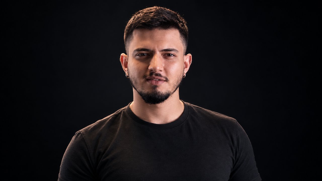 Talha Aslan, digital marketing expert, portrait on a black background